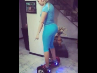 giselle learning to ride a hoverboard